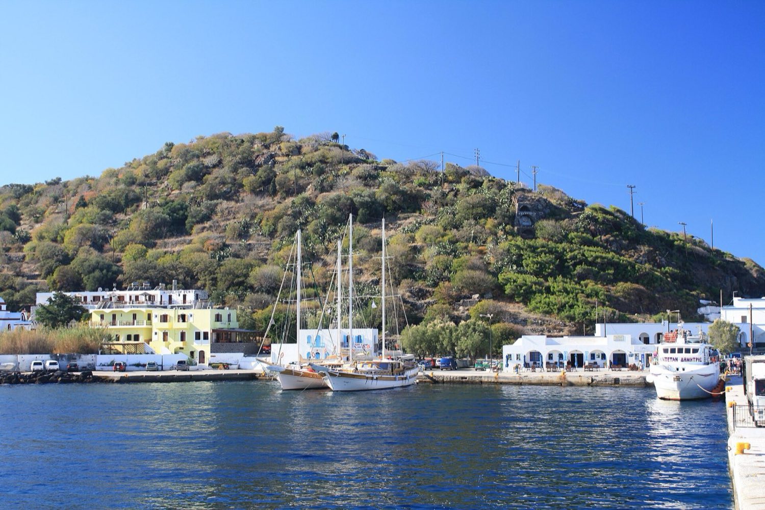 Whitewashed houses of Mandraki on Nisyros, the port town visited on volcano day trips from Kos