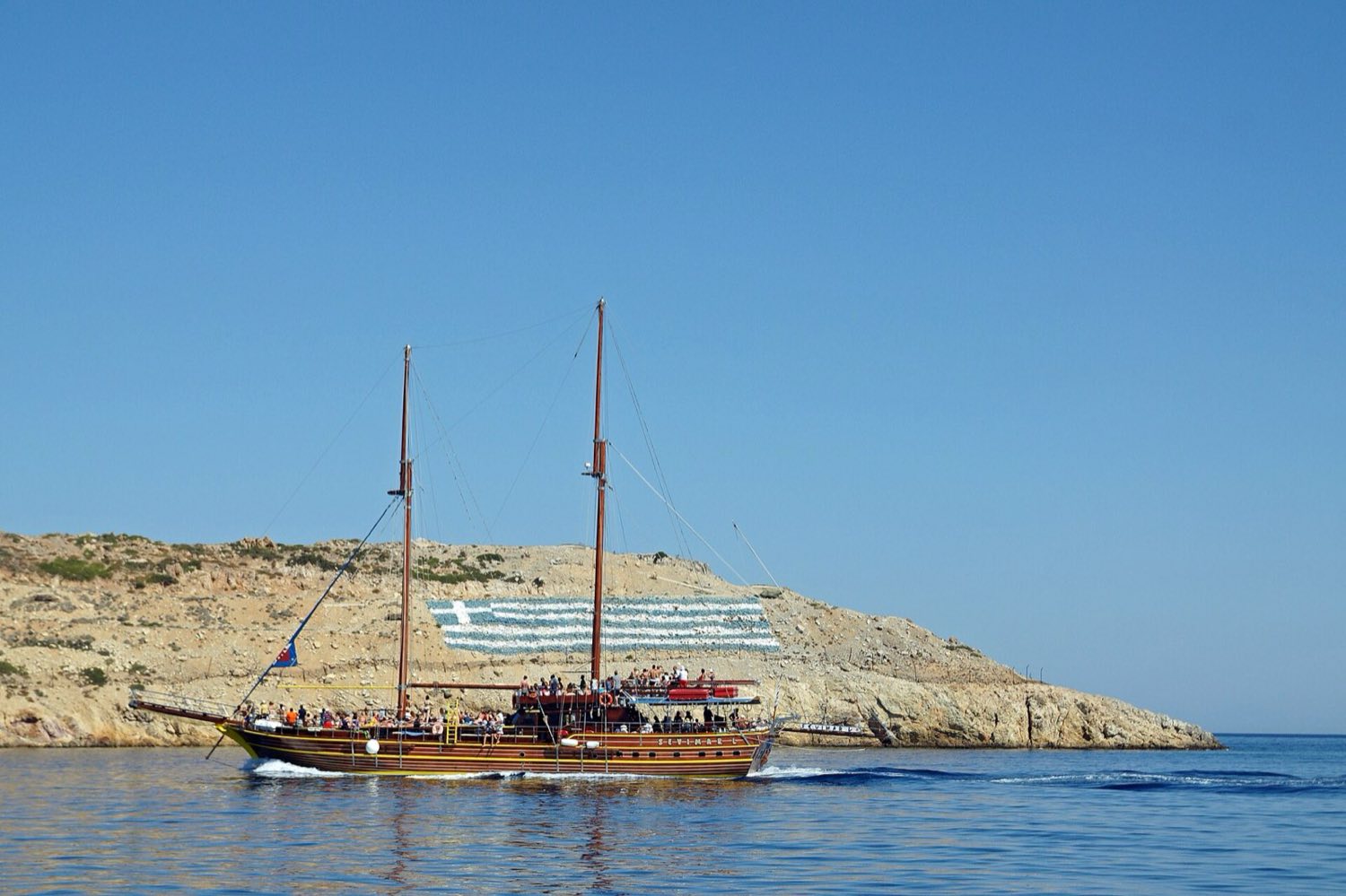 Quiet sandy bay at Pserimos, a common request on private boat trips from Kos